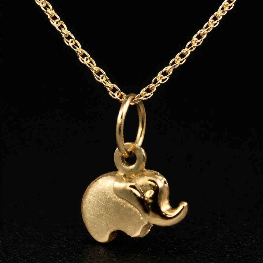 Handmade 14k Solid Gold Elephant Pedant and 14k Solid Gold 18inch chain.